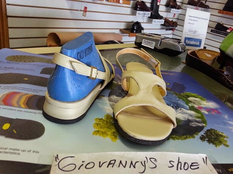 Giovanny's Shoe Repair storefront display
