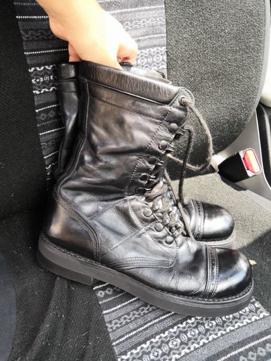 Black leather combat boots resoled and refinished