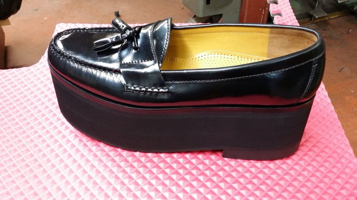 Black tassel loafer freshly resoled by Giovanny's Shoe Repair